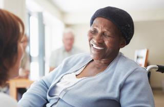 A stock photo of someone being cared for in their own home