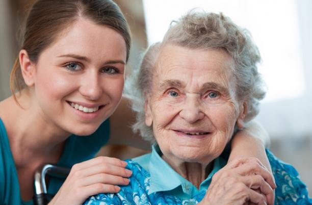 A stock image of a carer looking after someone