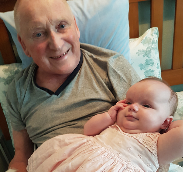 Gordon with his granddaughter