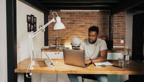 A stock photo of someone working at home